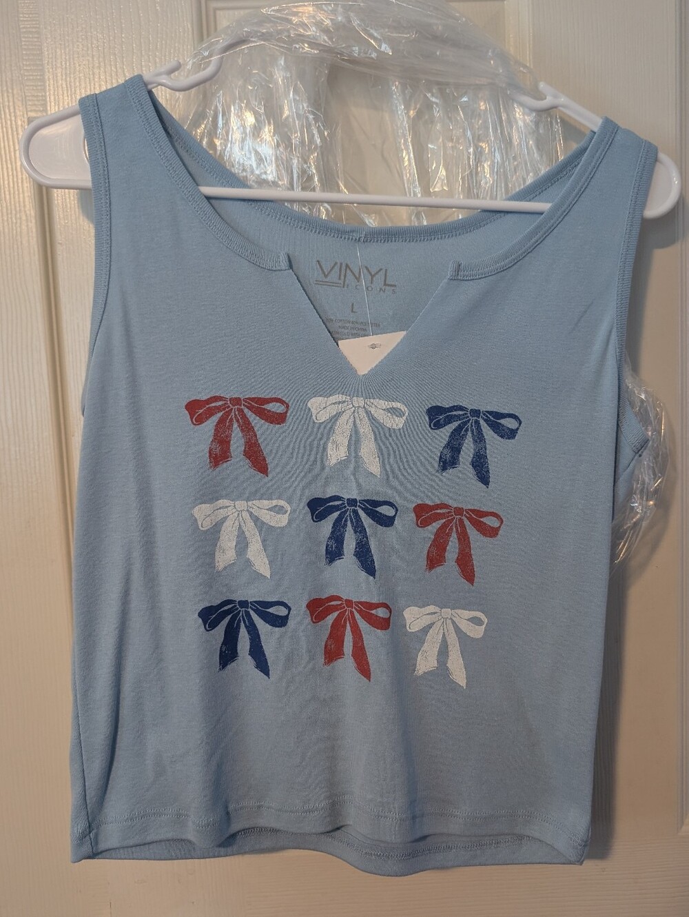 L Vinyl Icons - Brand Light Blue Sleeveless Top with Red, White & Navy Bows